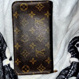 LOUIS VUITTON Port-Monnaie Billet Tressor L-Shaped Zip Wallet.